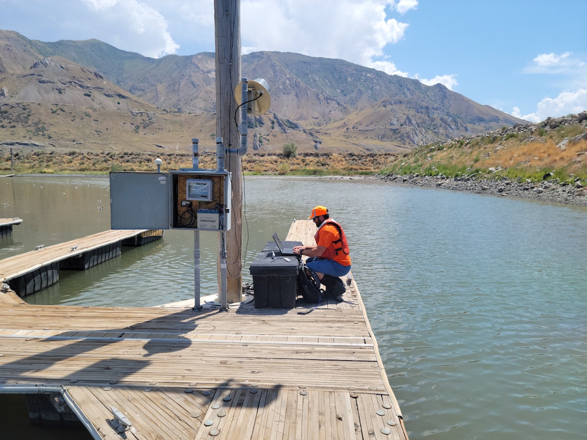 USGS hydrologic technician Travis Gibson confirms Great Salt Lake water levels at the SaltAire gauge.